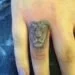 lion cubs finger tattoo